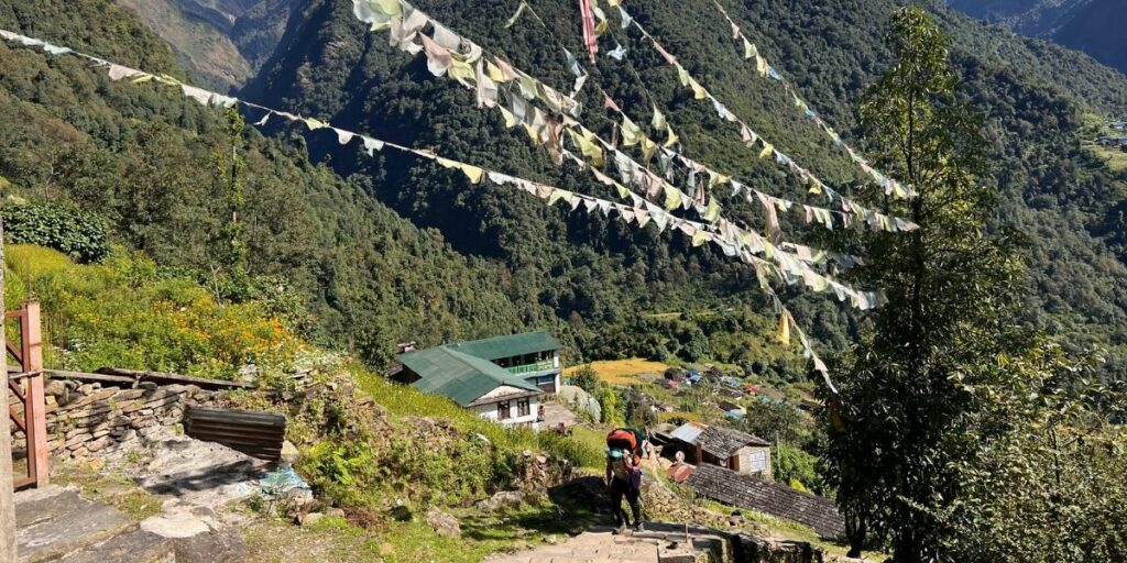 Colorful flags flutter above Annapurna foothills