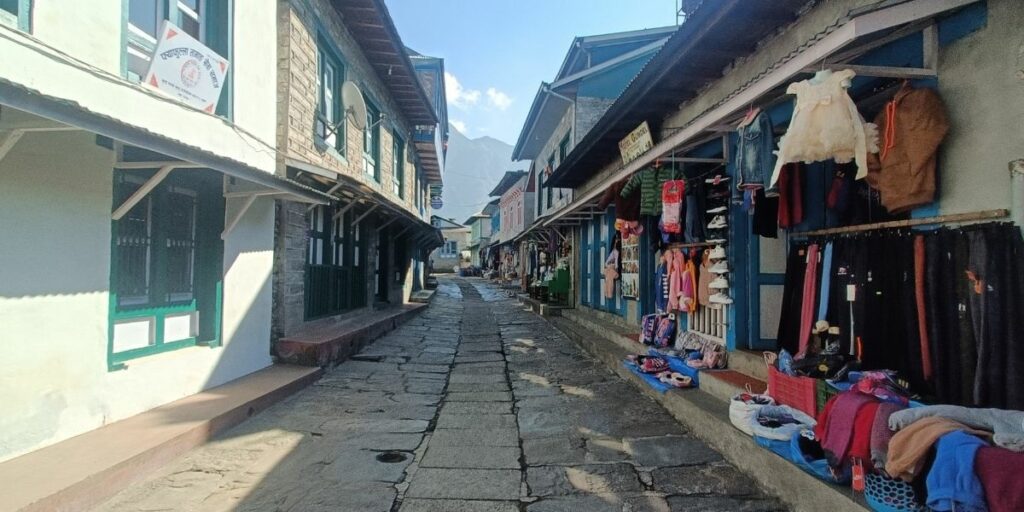 Rugged Namche Bazaar streets lined with local stores