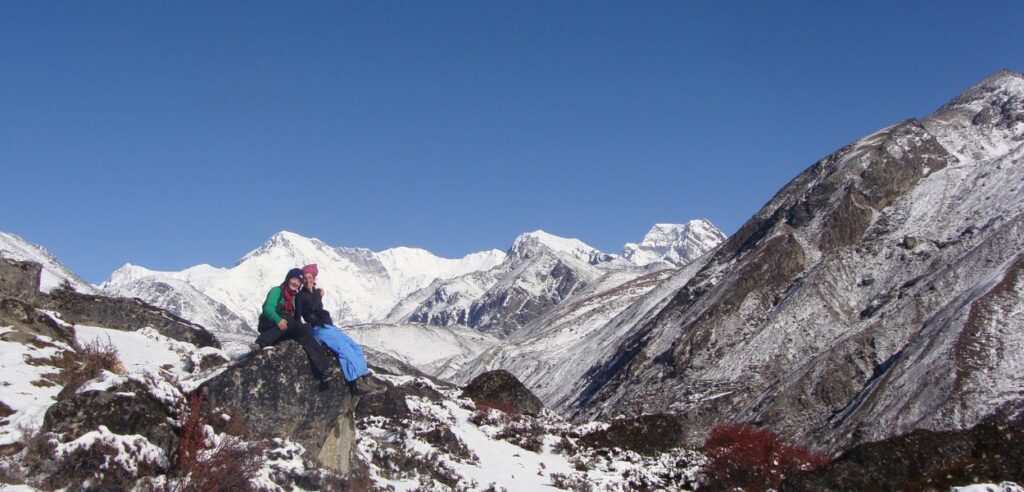 female travellers enjoying the snow capped view of ebc