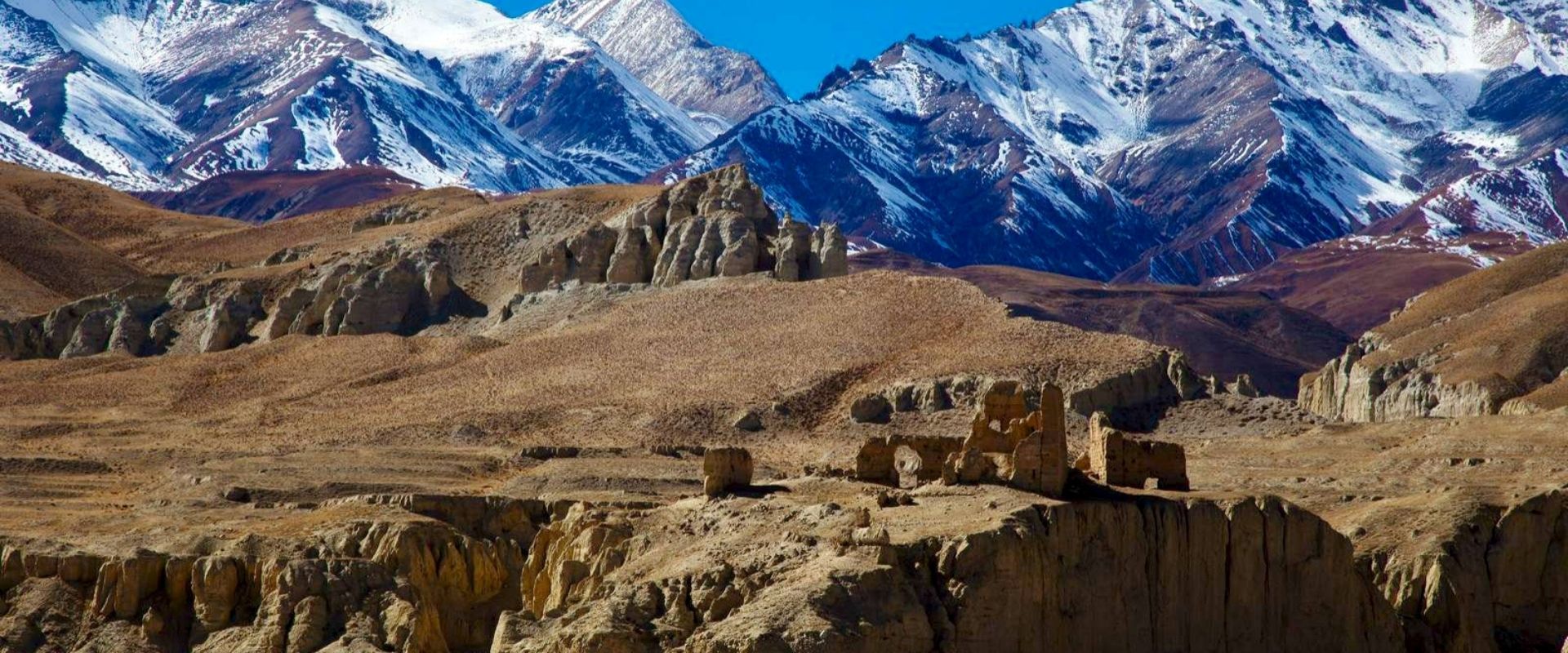 Dry hills and snow peaks in Upper Mustang