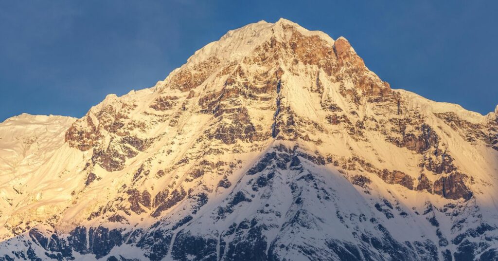 Golden rays illuminating Mount Annapurna