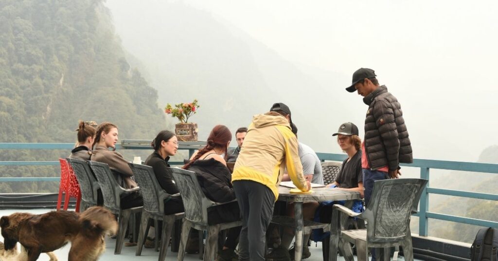 Guide briefing trekkers for Annapurna Base Camp hike