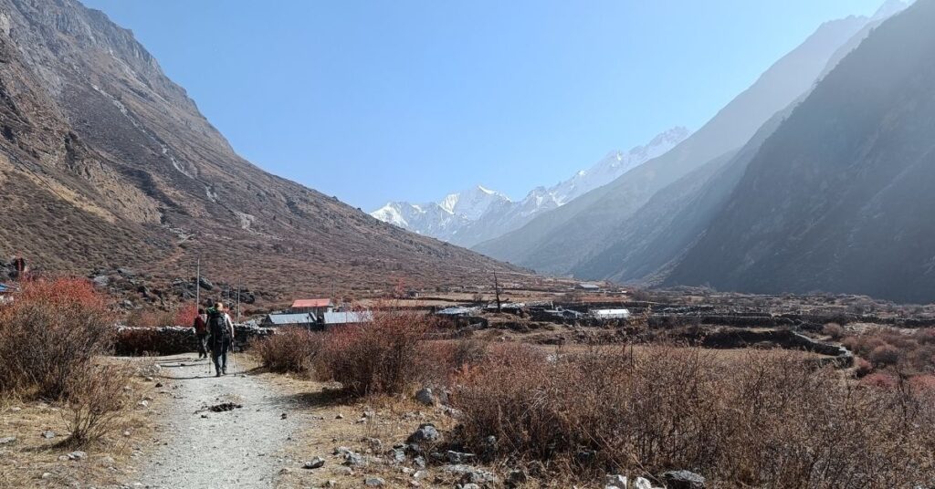 Hiker enjoying mountain views on rugged Langtang trail