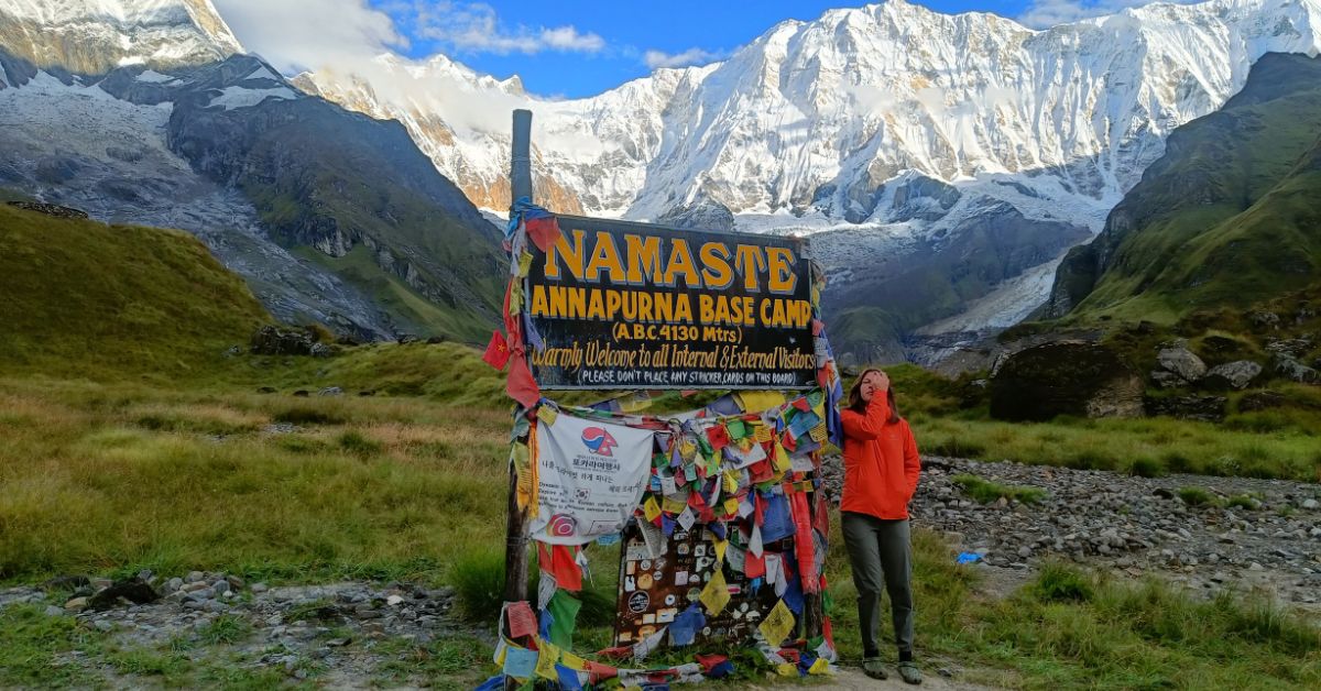 Trekker leaving ABC at day 4 after clicking photos at base camp