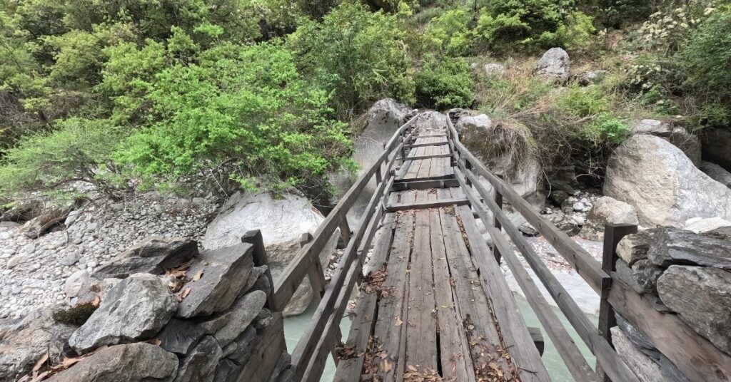Wooden bridge on high Manaslu trail