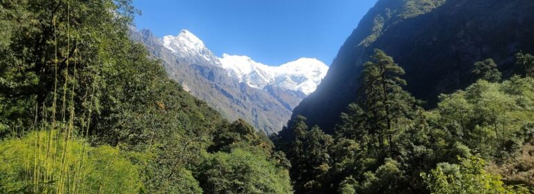 Autumn landscape with snowy peaks while trekking in Nepal