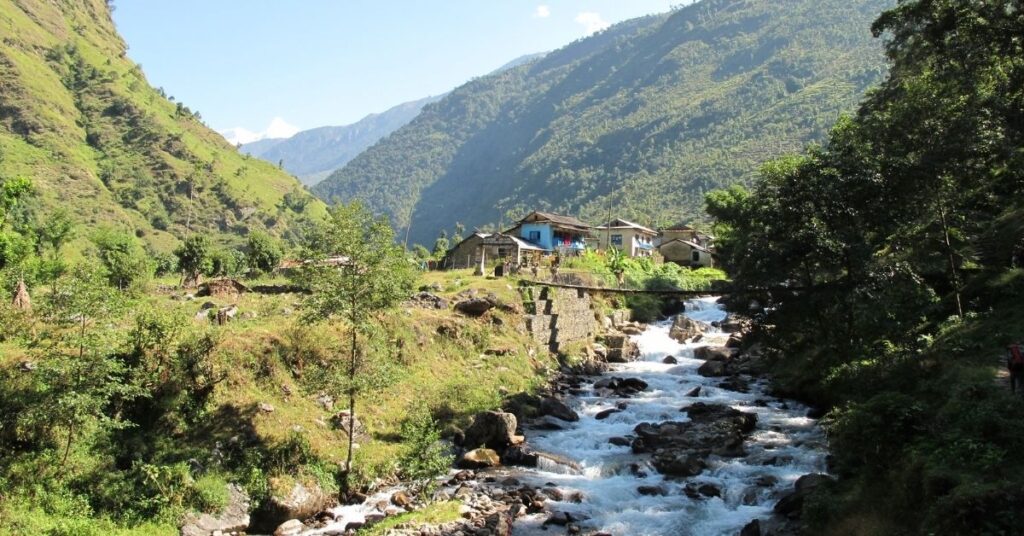 Clear autumn skies over terraced hills on the Everest Base Camp route