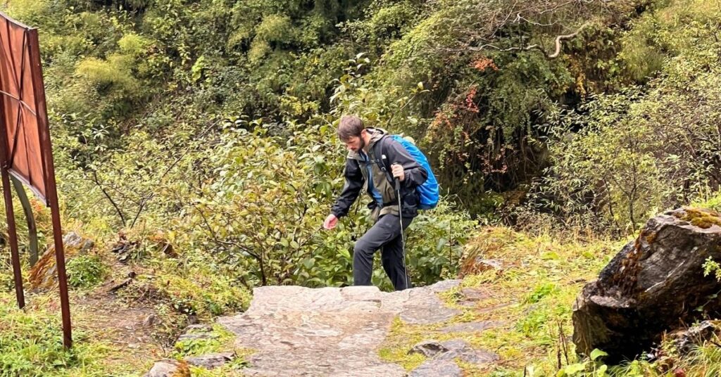 Solo hiker making their way along the scenic trail to Annapurna Base Camp