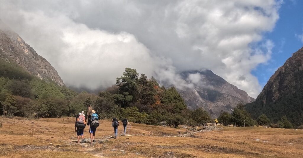 trekking in kanchenjunga circuit with guide and porters