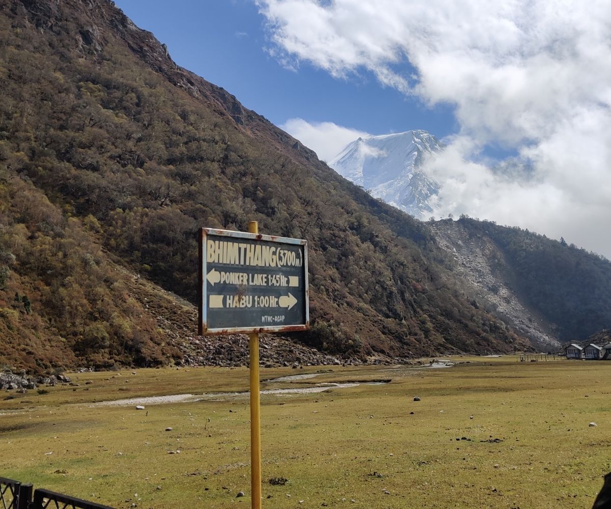 Day at Bhimtang (3,700 m) with signpost pointing to Ponker Lake and Habu
