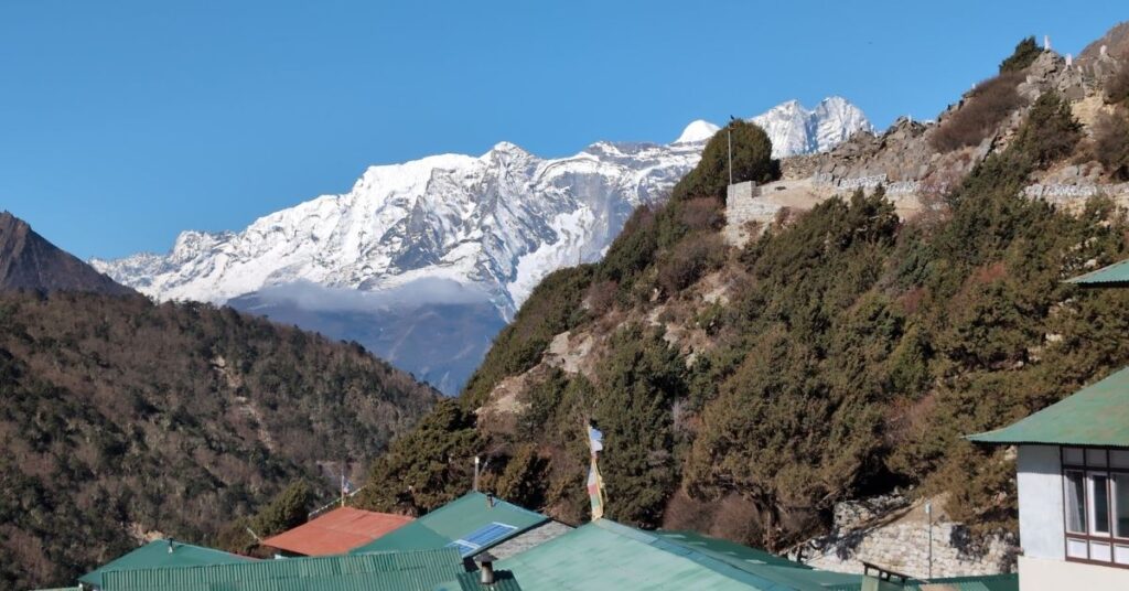 Everest view in September with clear post-monsoon skies above Namche rooftops