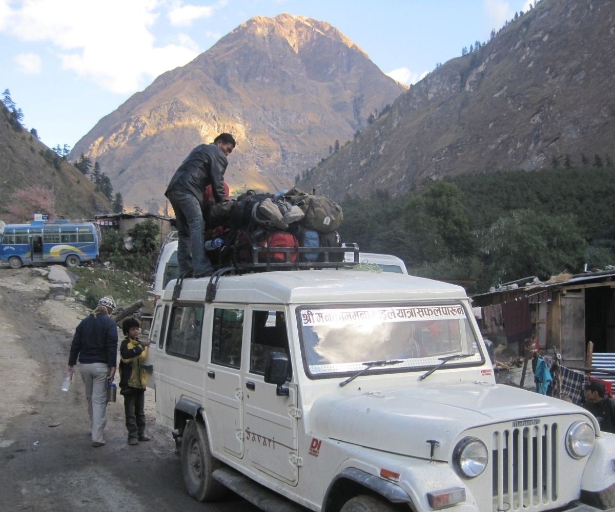 Local rider helping trekkers by carrying packages to trail start point