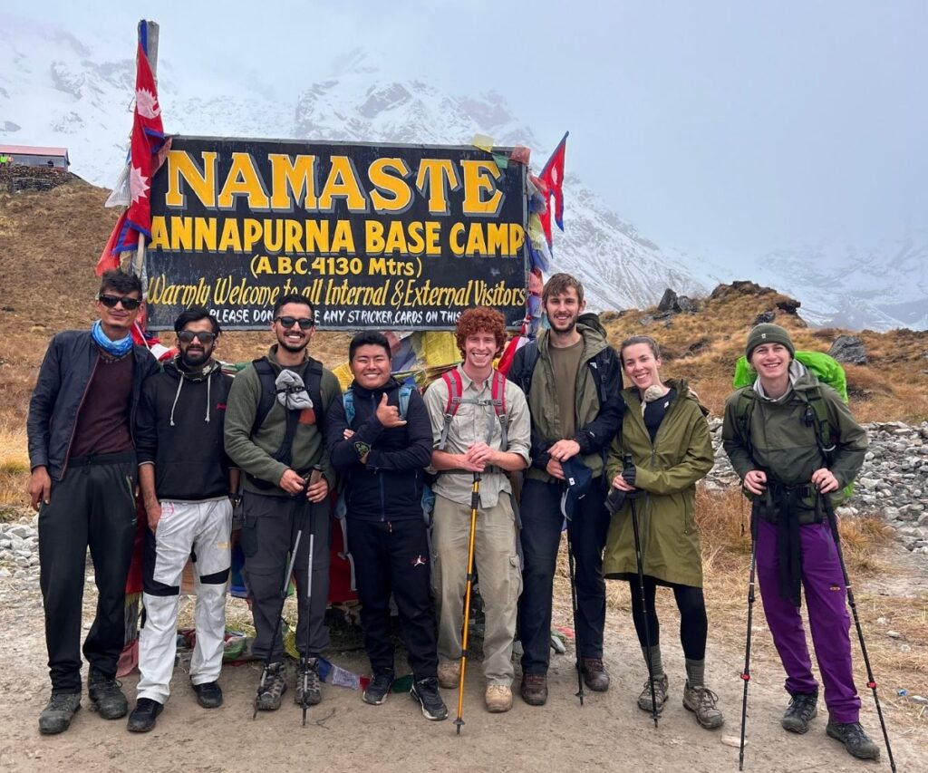 hikers reaching the base camp of annapurna in october