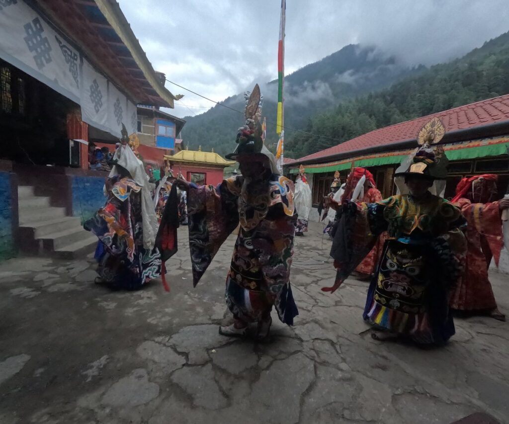 Traditional monastery mask dance during Manaslu travel