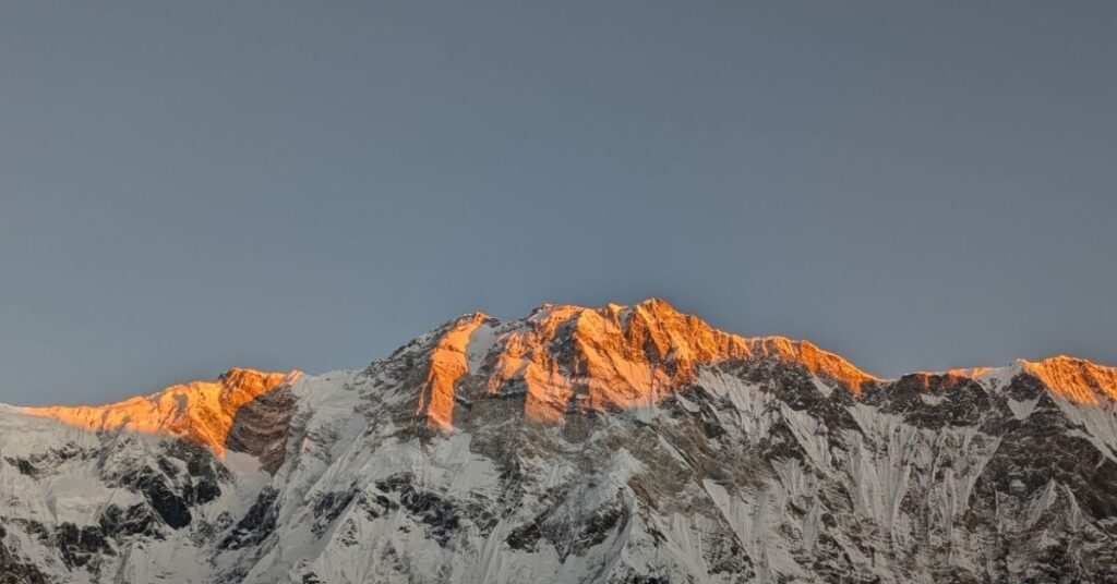 Morning sun illuminating the Annapurna mountain range