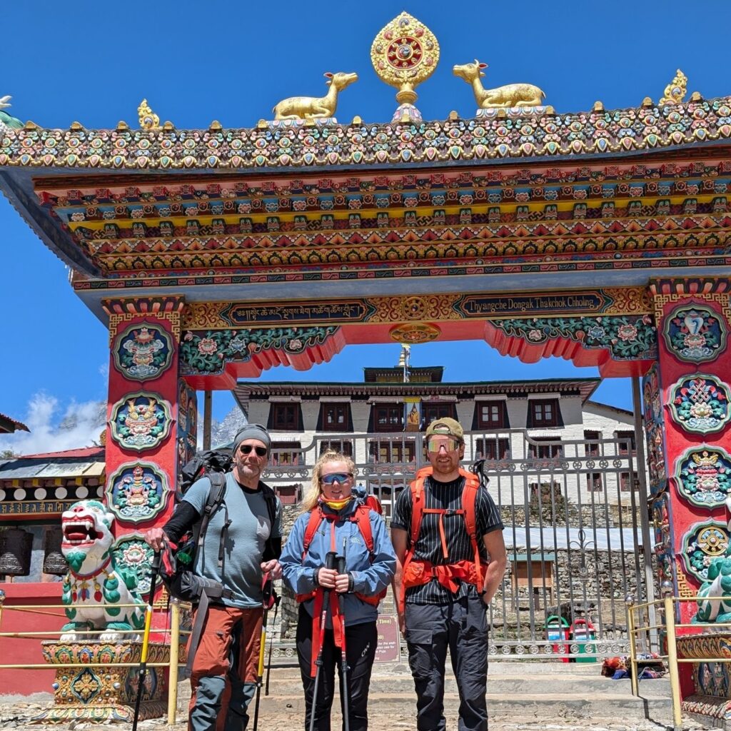 Group trekker posing at Tengboche on everest